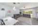 Open floor plan provides plenty of space for living and dining highlighted by sliding doors leading to outdoor living at 4927 Sw 45Th Cir, Ocala, FL 34474