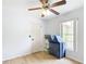 Bright bedroom features laminate floors, ample natural light, and a playful play area for children at 505 Fisher Rd, Ocklawaha, FL 32179