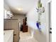 Laundry room area featuring a washer and dryer with additional storage space at 505 Fisher Rd, Ocklawaha, FL 32179