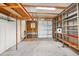 Spacious garage with shelving and work area at 518 Saint Andrews Blvd, Lady Lake, FL 32159