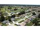 A neighborhood featuring houses, lawns, trees, and proximity to a golf course at 5340 Nw 26Th Ln, Ocala, FL 34482