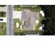Clean aerial view showcasing the roof, lawn, and landscaping of a single story home at 5340 Nw 26Th Ln, Ocala, FL 34482