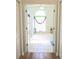 Bright bathroom features a soaking tub and a window at 5340 Nw 26Th Ln, Ocala, FL 34482
