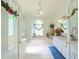 Bright bathroom with tub, shower and large vanity at 5340 Nw 26Th Ln, Ocala, FL 34482