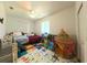 Bedroom with a tent, toys, and bed at 5340 Nw 26Th Ln, Ocala, FL 34482