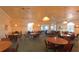 Common area or dining hall with multiple tables and chairs, and pendant lighting at 5340 Nw 26Th Ln, Ocala, FL 34482