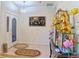 Bright foyer area featuring ceramic floors and decorative touches, providing a warm welcome at 5340 Nw 26Th Ln, Ocala, FL 34482
