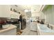 Well-lit kitchen features white cabinets, stainless steel appliances, and an eat-in area at 5340 Nw 26Th Ln, Ocala, FL 34482
