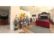 Bright and open living room featuring hardwood floors and ample space for entertaining at 5340 Nw 26Th Ln, Ocala, FL 34482
