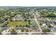 Residential neighborhood featuring single-Gathering homes, mature trees, manicured lawns, and swimming pools at 5437 Se 34Th St, Ocala, FL 34480