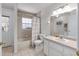 Full bathroom with tiled shower and tub, and a vanity that offers sufficient storage at 5437 Se 34Th St, Ocala, FL 34480