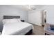 Comfortable bedroom with a large closet, light walls, and nice laminate floors at 5437 Se 34Th St, Ocala, FL 34480