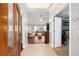 Inviting foyer with views of the living room and office space featuring tile floors at 5437 Se 34Th St, Ocala, FL 34480