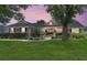 Charming single-story home with mature landscaping, manicured lawn, and an inviting entrance at 5437 Se 34Th St, Ocala, FL 34480