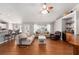 Bright and airy living room with hardwood floors, bar, and comfortable seating at 5437 Se 34Th St, Ocala, FL 34480