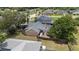 Aerial view of a single-Gathering home featuring a screened pool and fenced backyard at 5437 Se 34Th St, Ocala, FL 34480