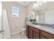 Bright bathroom featuring granite countertops, and neutral paint at 5653 Sw 50Th Ter, Ocala, FL 34474