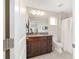 Bathroom features granite-topped vanity, recessed lighting, and a shower/tub combination at 5653 Sw 50Th Ter, Ocala, FL 34474