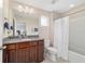 Bathroom features granite-topped vanity, recessed lighting, and a shower/tub combination at 5653 Sw 50Th Ter, Ocala, FL 34474