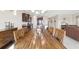 Spacious dining area with access to kitchen and living room with hardwood table and ample seating at 5653 Sw 50Th Ter, Ocala, FL 34474