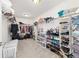 Walk-in closet offers generous storage with shelving and racks for organization at 5653 Sw 50Th Ter, Ocala, FL 34474