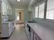 Cozy kitchen with white cabinets, sleek countertops, and modern appliances at 616 Water Rd, Ocala, FL 34472