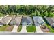 Aerial view of the neighborhood homes with well-maintained lawns at 6557 Se 4Th Ln, Ocala, FL 34472