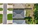 An aerial view of a home features a manicured lawn and roof at 6557 Se 4Th Ln, Ocala, FL 34472