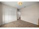 Bright bedroom with carpet, closet, and neutral colors, ideal for relaxation at 6557 Se 4Th Ln, Ocala, FL 34472