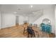 Dining area with wood table and chairs near the staircase at 7199 Sw 60Th Ln, Ocala, FL 34474