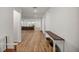 Bright entryway with wood floors leads to open living area with lots of natural light at 7199 Sw 60Th Ln, Ocala, FL 34474