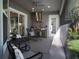 The screened porch area features a built-in stainless steel outdoor kitchen, perfect for entertaining at 8033 Nw 29Th Street Rd, Ocala, FL 34482