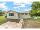 Backyard featuring a patio and landscaping at 8375 Sw 109Th Lane Rd, Ocala, FL 34481