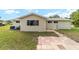 Backyard of a house with a patio and lawn at 8375 Sw 109Th Lane Rd, Ocala, FL 34481