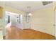 Cozy dining area with classic white built-in cabinet and wood floors at 8375 Sw 109Th Lane Rd, Ocala, FL 34481