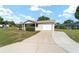 Inviting single-story home with a driveway and attached garage, set in a peaceful neighborhood at 8375 Sw 109Th Lane Rd, Ocala, FL 34481