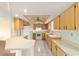 Bright kitchen with plenty of counter space, a breakfast bar, and matching appliances at 8375 Sw 109Th Lane Rd, Ocala, FL 34481