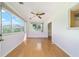 Inviting living room with hardwood floors and bright, sunlit windows at 8375 Sw 109Th Lane Rd, Ocala, FL 34481