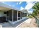 View of screened porch and adjacent sunroom, blending indoor and outdoor living at 8463 Sw 108Th Pl, Ocala, FL 34481