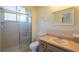 Bathroom with walk-in shower and single vanity at 8463 Sw 108Th Pl, Ocala, FL 34481