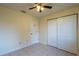 Bedroom featuring double sliding door closet at 8463 Sw 108Th Pl, Ocala, FL 34481