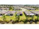 Expansive aerial view of a residential community featuring well-maintained lawns and uniform home designs at 8820 Sw 58Th Street Rd, Ocala, FL 34481
