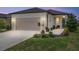 Charming single-Gathering home with a two-car garage, landscaped yard, and inviting front porch at 8820 Sw 58Th Street Rd, Ocala, FL 34481