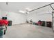 Spacious two-car garage with ample storage space and a clean, organized layout at 8820 Sw 58Th Street Rd, Ocala, FL 34481