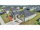 Single-story home featuring a well-kept lawn, minimal landscaping, and a two-car garage at 9266 Sw 58Th Cir, Ocala, FL 34476