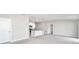 Bright open-concept living area showcasing a seamless transition into a modern, well-lit kitchen at 9266 Sw 58Th Cir, Ocala, FL 34476
