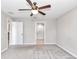 This main bedroom features a ceiling fan and an ensuite bathroom at 9266 Sw 58Th Cir, Ocala, FL 34476