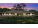 Charming single-story home with a neutral color scheme, brick accents, and a dark fence at 9462 Sw 72Nd Ct, Ocala, FL 34476