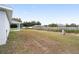 A view of a big, empty backyard, ready for a homeowner's personal touch at 9731 Bahia Rd, Ocala, FL 34472