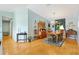 Elegant dining room with hardwood floors, classic furnishings, and an open design perfect for entertaining at 9853 Se 175Th Pl, Summerfield, FL 34491